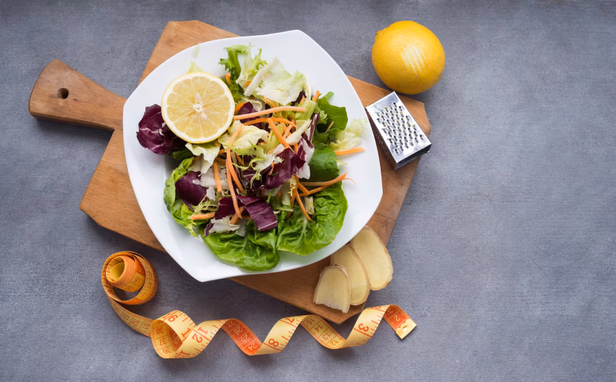 vegetable-salad-wooden-board-with-measuring-tape_23-2148035005